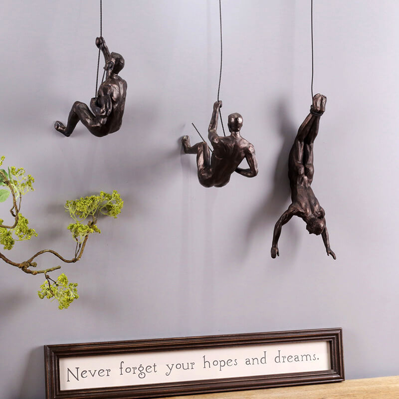 Climber wall art sculpture, versatile modern decor for both contemporary homes & offices.