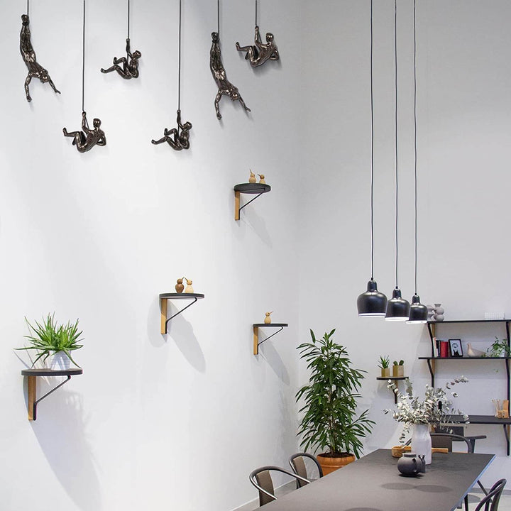 Unique climber wall art for living rooms. Modern home decor sculpture, inspiring and artistic.