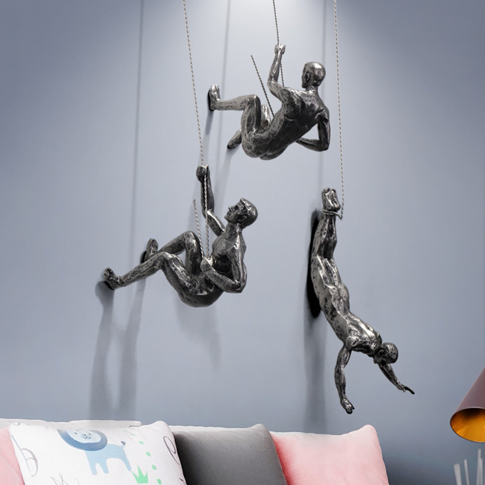 Contemporary climber sculpture, minimalist wall art for modern home or office interior design.