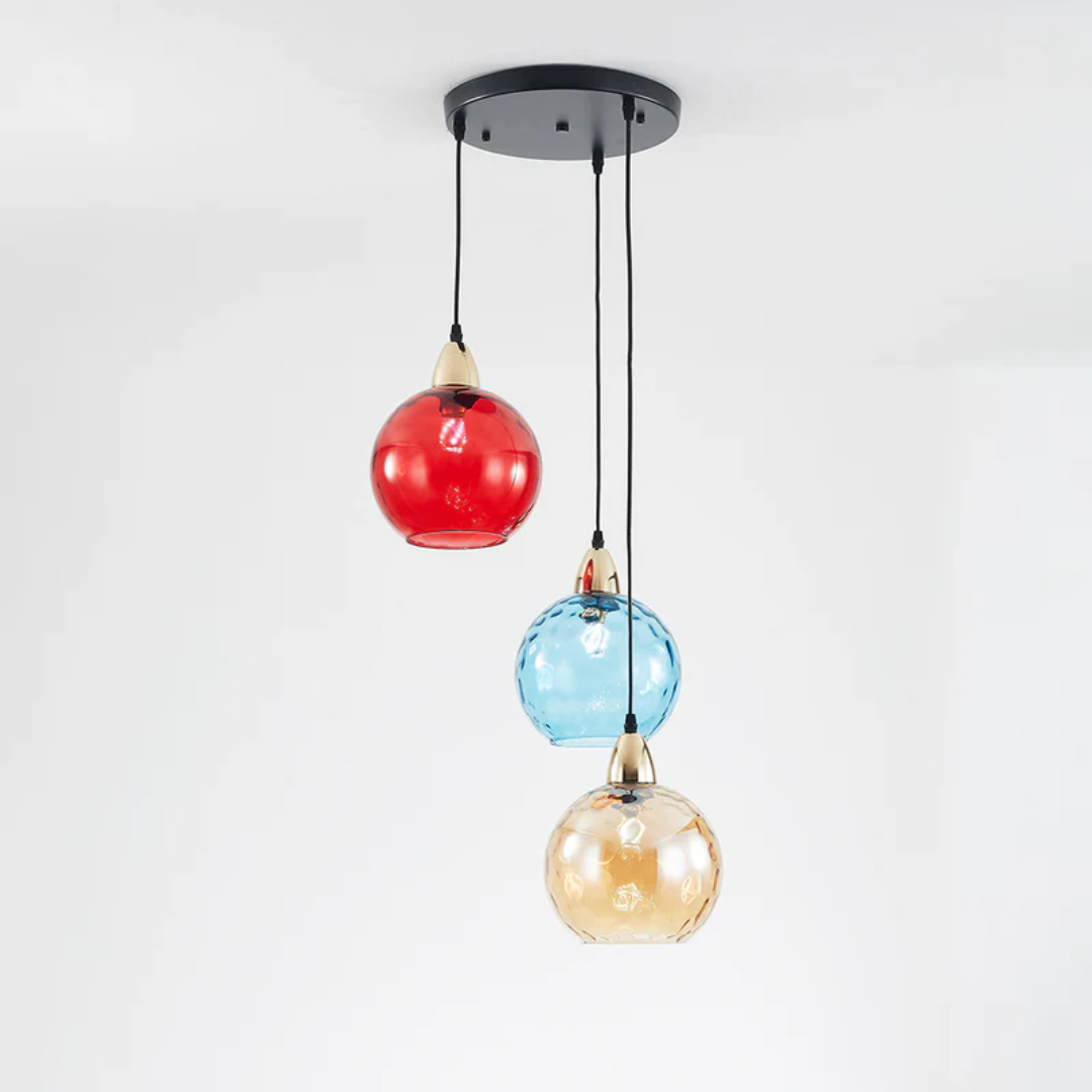 Indoor modern lighting: 3-lamp cluster pendant light, enhancing living room ambiance.