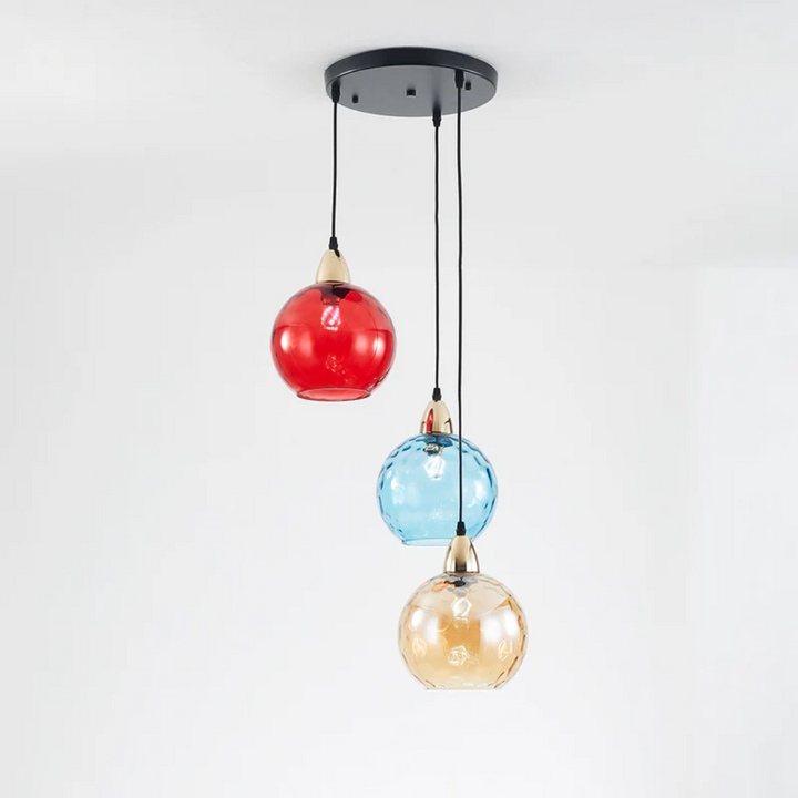 Indoor modern lighting: 3-lamp cluster pendant light, enhancing living room ambiance.