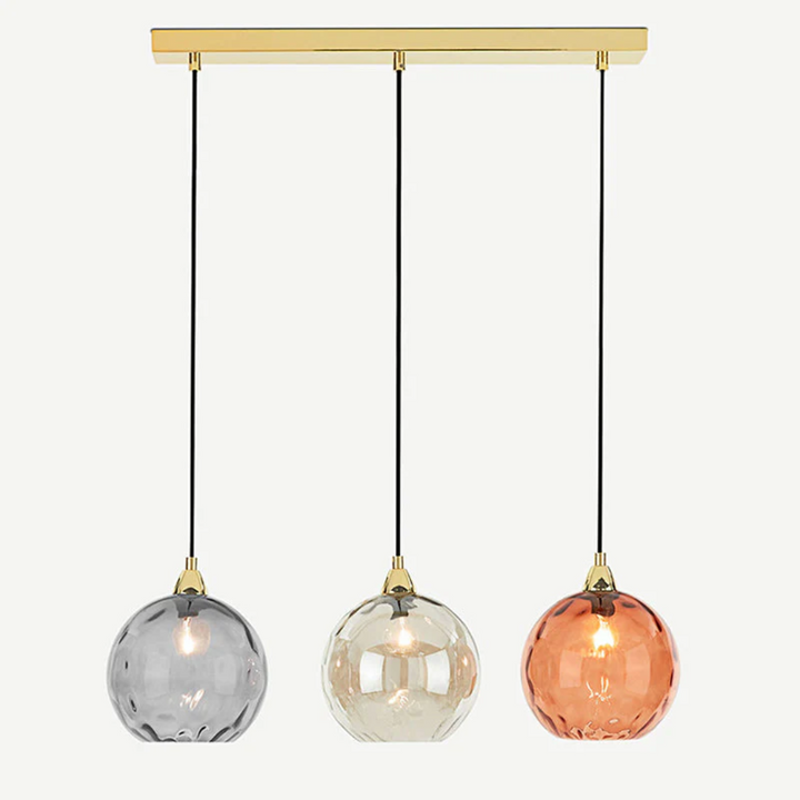 Modern indoor lamp: 3-lamp cluster pendant, a statement piece for dining rooms.
