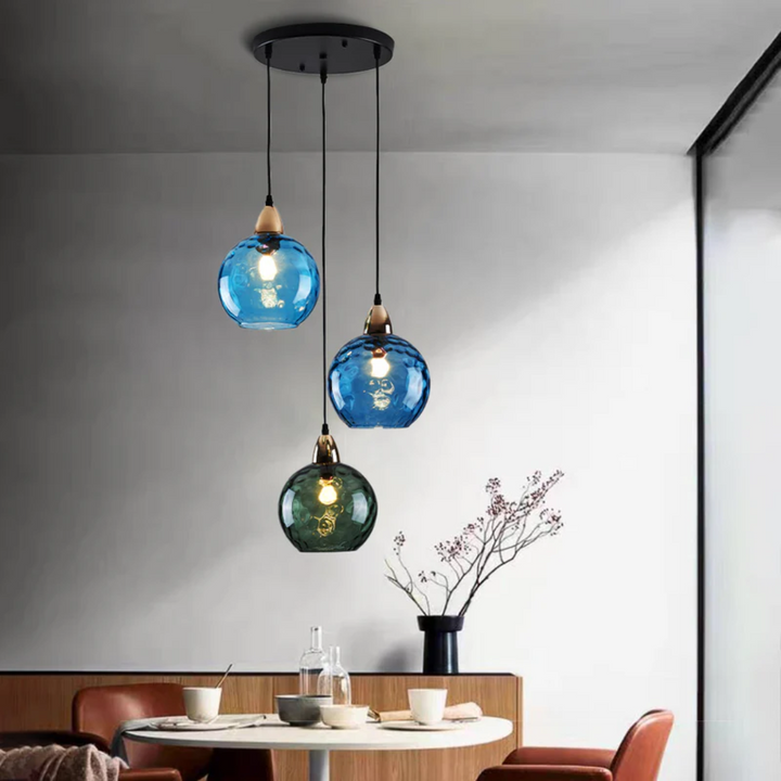 Versatile 3-lamp cluster pendant, modern lighting solution for various room types.