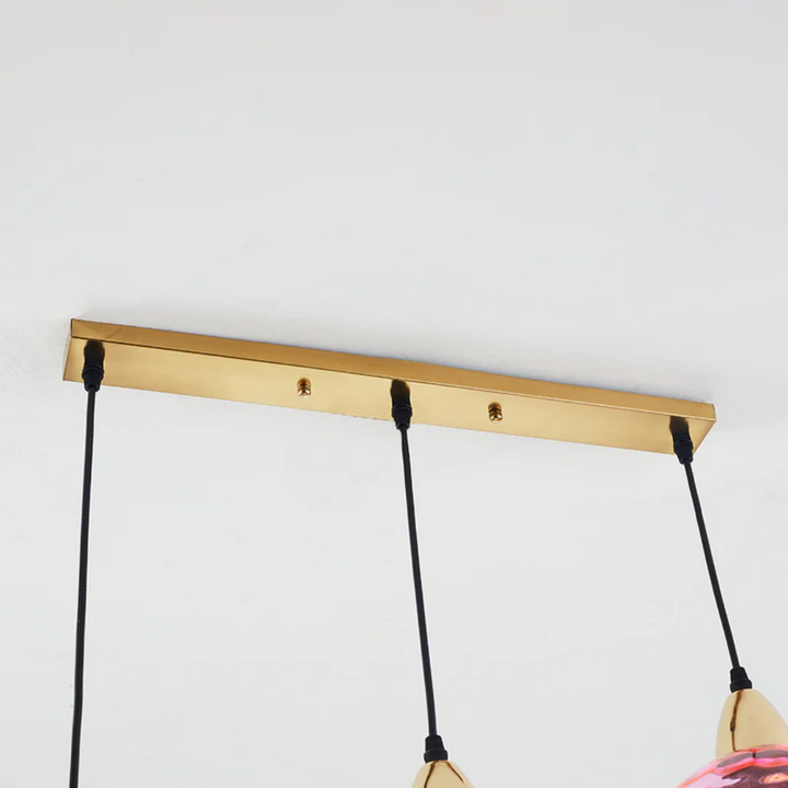 Decorative LED cluster pendant light with three adjustable lamps, modern home decor.