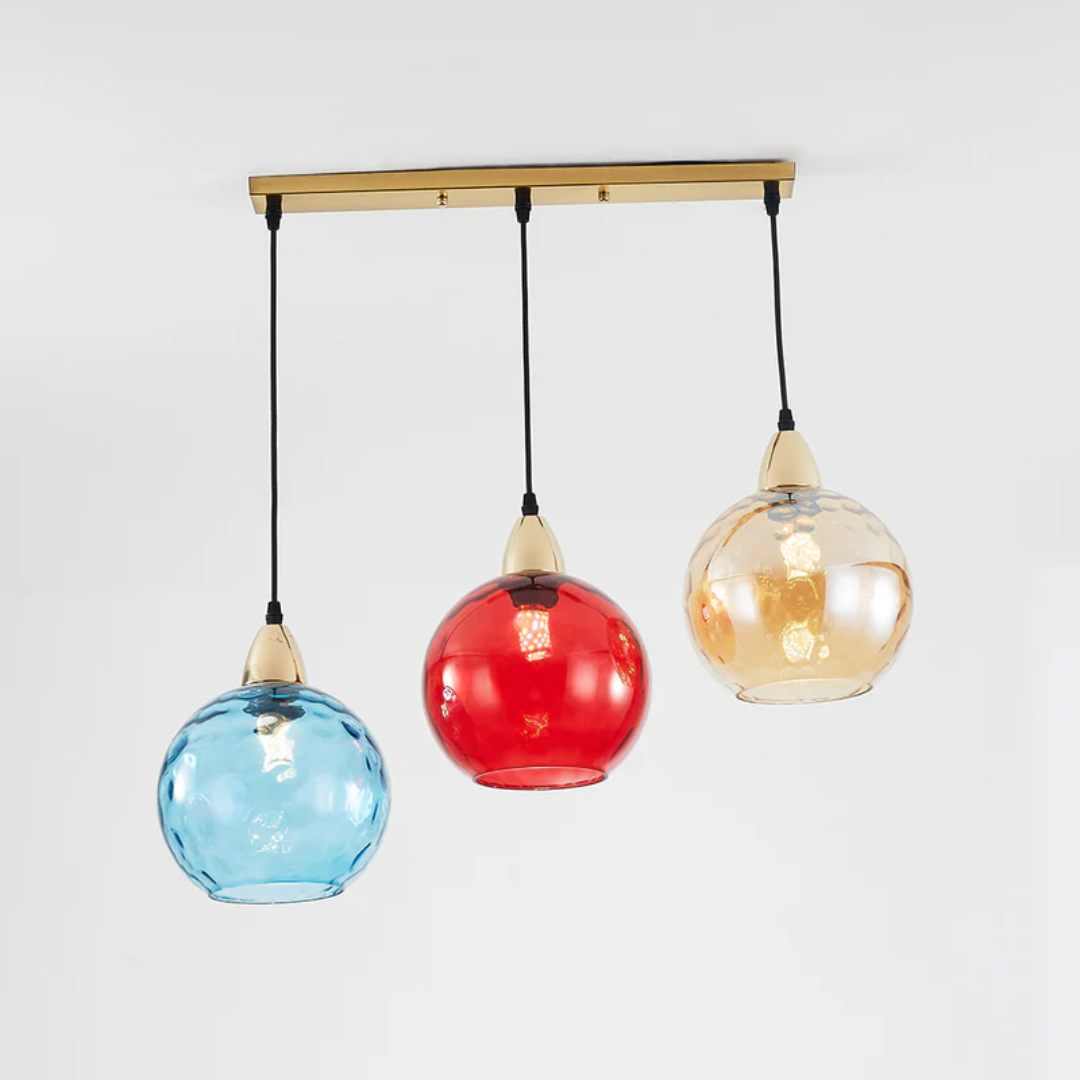 Stylish cluster ceiling light with three individual lamps, perfect for modern interiors.