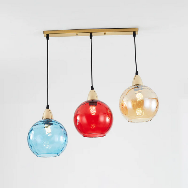 Stylish cluster ceiling light with three individual lamps, perfect for modern interiors.