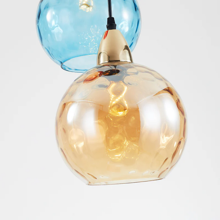 Modern home decor: 3-lamp cascade pendant light, a focal point in any room.