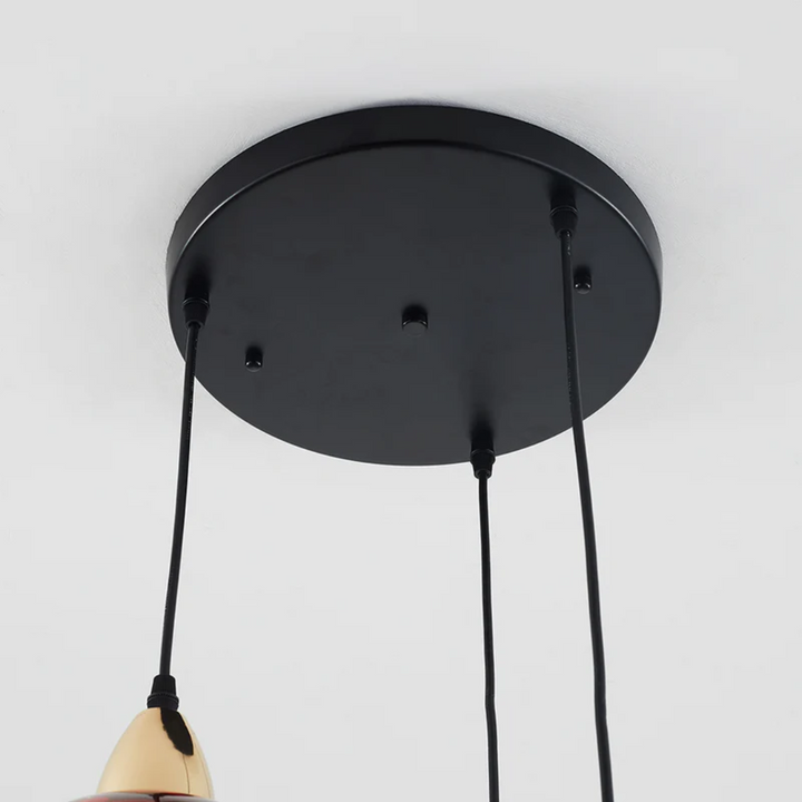 Elegant 3-light cluster pendant, contemporary design for dining areas and bedrooms.