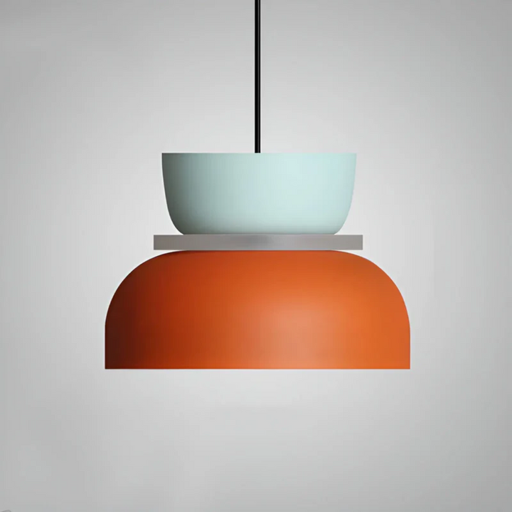 Decorative colorful macaron LED pendant light illuminating a modern living room setting.