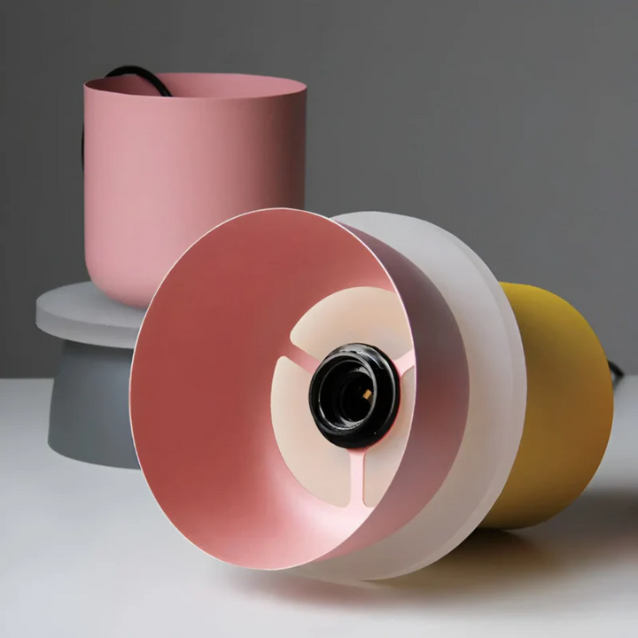 A playful cluster of colorful macaron LED pendant lights, creating a unique ceiling decor.