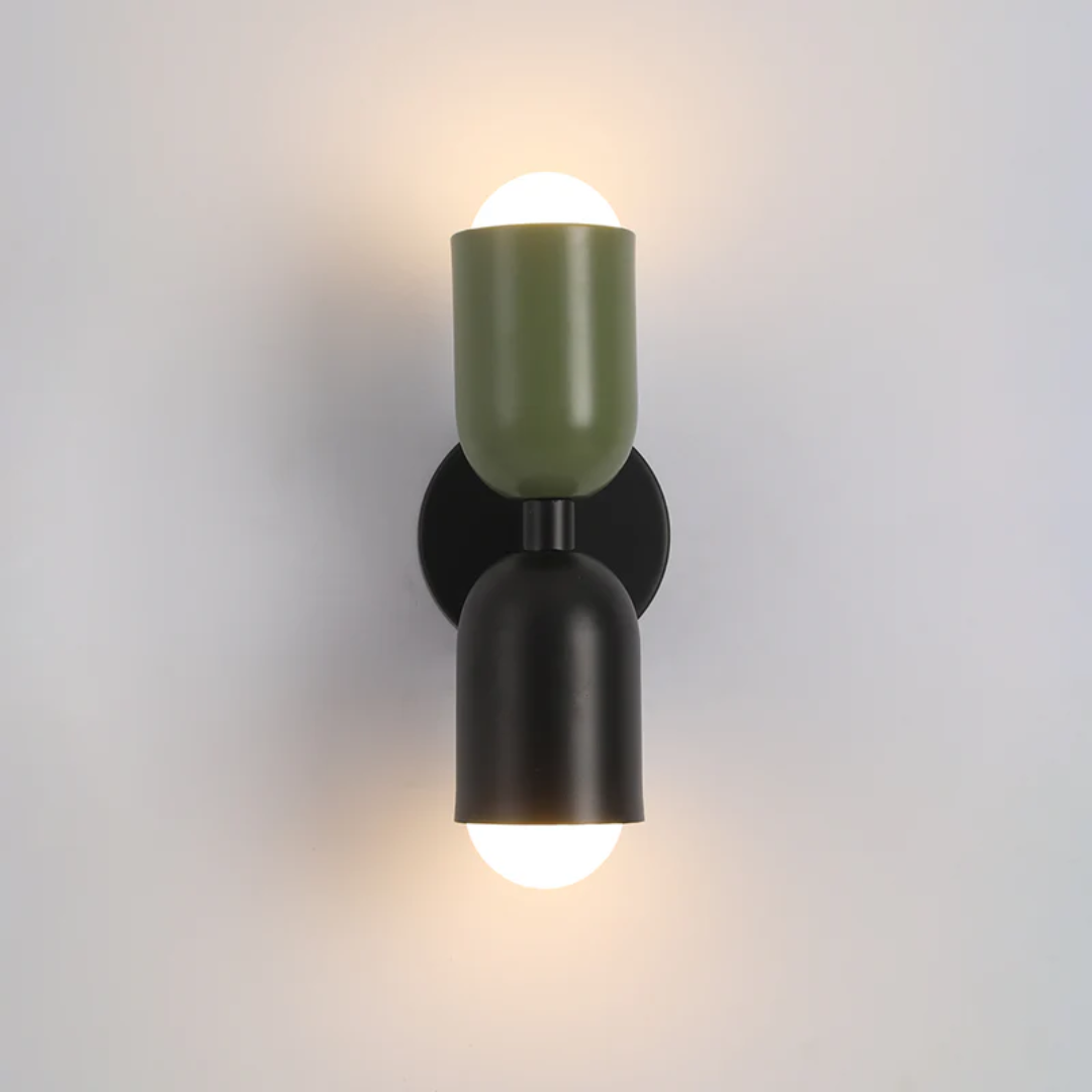 Mounted ColorWave double-sided LED wall lamp illuminating a modern living space with soft, decorative light.