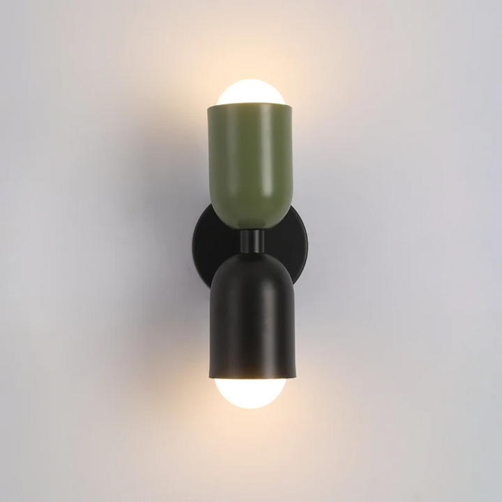 Mounted ColorWave double-sided LED wall lamp illuminating a modern living space with soft, decorative light.