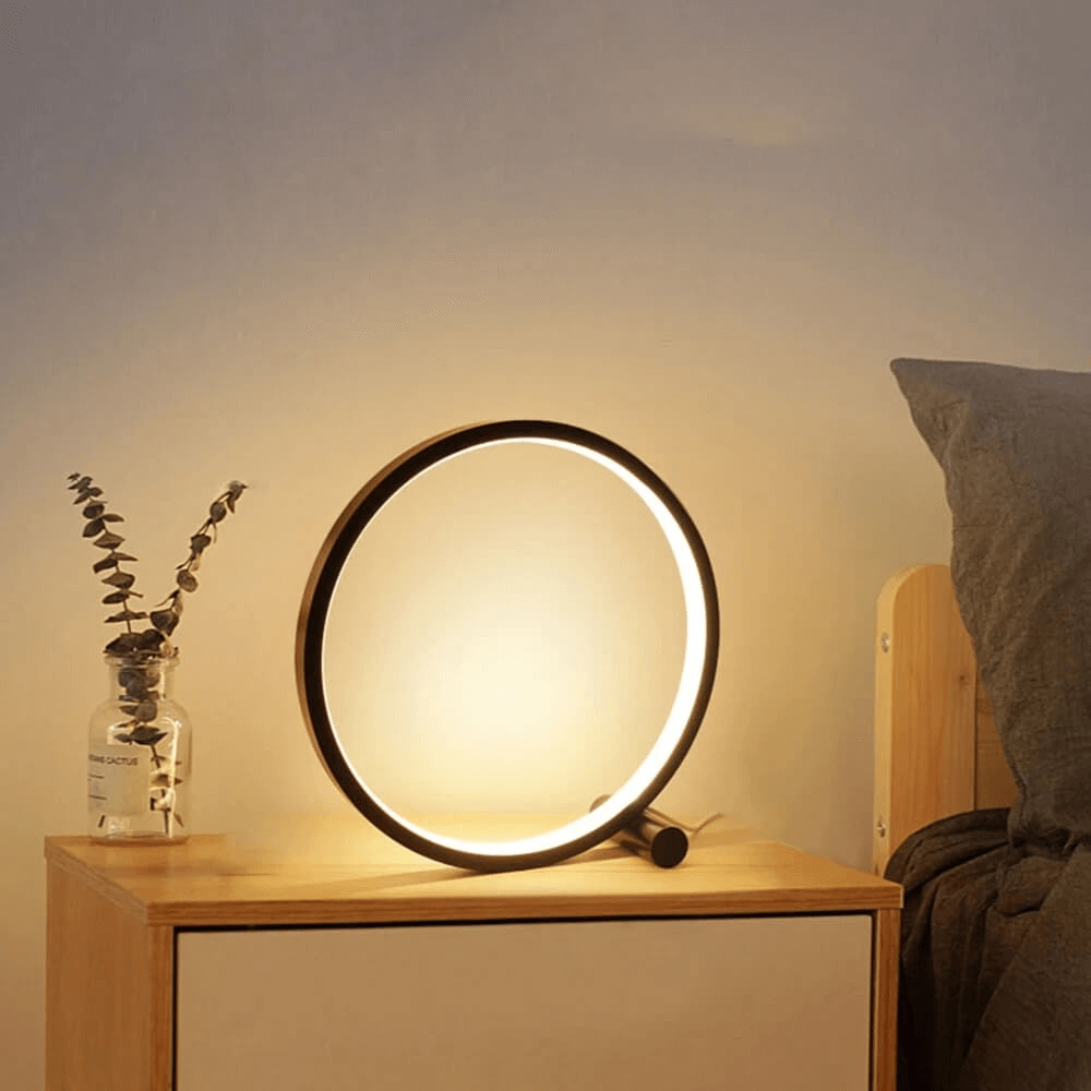 Contemporary dimmable LED table lamp for living rooms, offering warm ambient lighting and touch control.