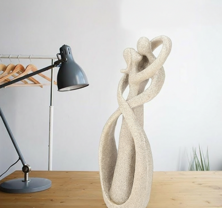 Elegant abstract love sculpture, 'Eternal Embrace' figurine for modern home decor. Perfect unique shelf accent or living room art.