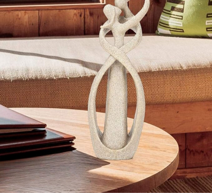 Artistic 'Eternal Embrace' abstract figurine with flowing lines. Represents modern love; a stunning home accent or unique gift.