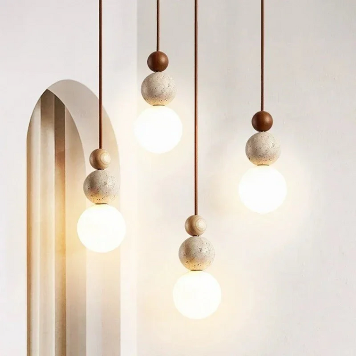 Unique geometric pendant lamp with travertine & mahogany wood, enhancing interior design.