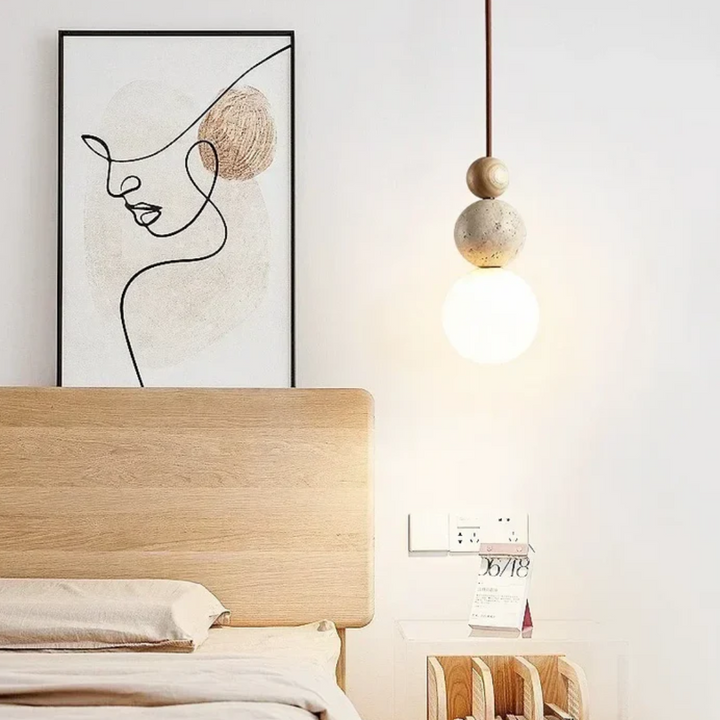 Ambient geometric pendant light for kitchen lighting, made from travertine & mahogany.