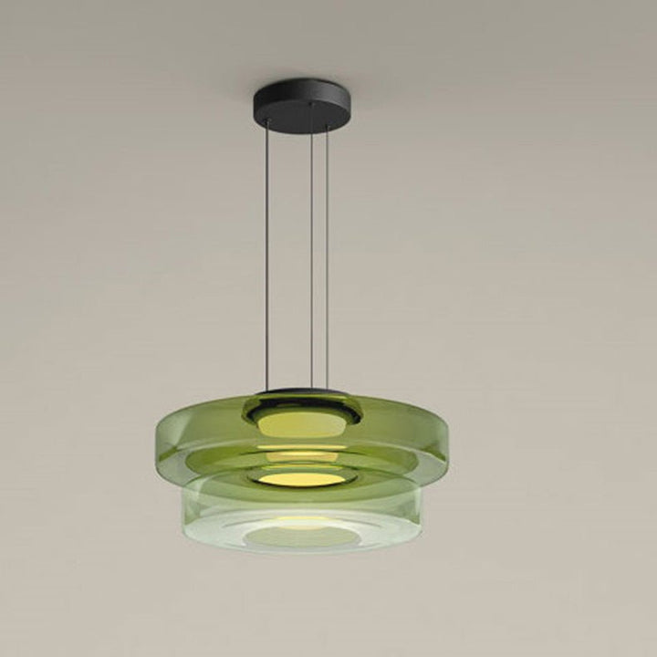 "Modern glass pendant lamp in Bauhaus design, smoke grey shade, adjustable cable, warm LED glow, ideal for home interiors."
