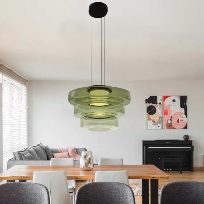 "Modern glass pendant lamp in Bauhaus design, smoke grey shade, adjustable cable, warm LED glow, ideal for home interiors."