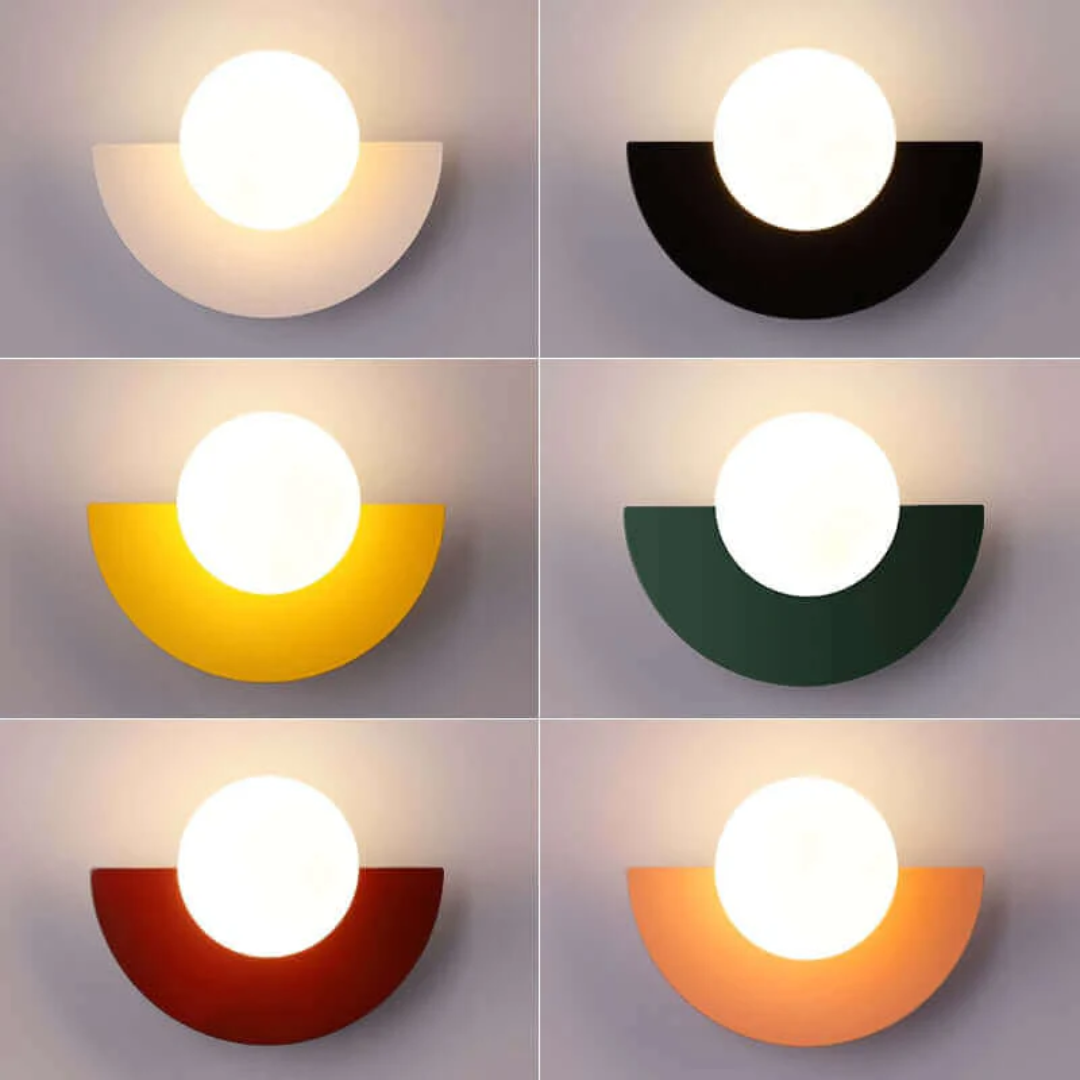 Stylish metal half moon LED wall light for modern living rooms, bedrooms, or hallways.