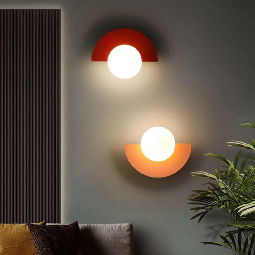 Contemporary metal half moon wall light, providing warm LED ambient lighting for any room.
