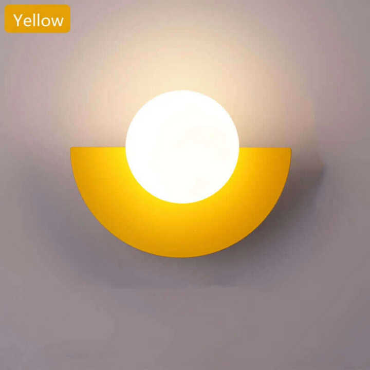 Minimalist metal half moon LED wall light, perfect for modern home decor & energy-efficient lighting.