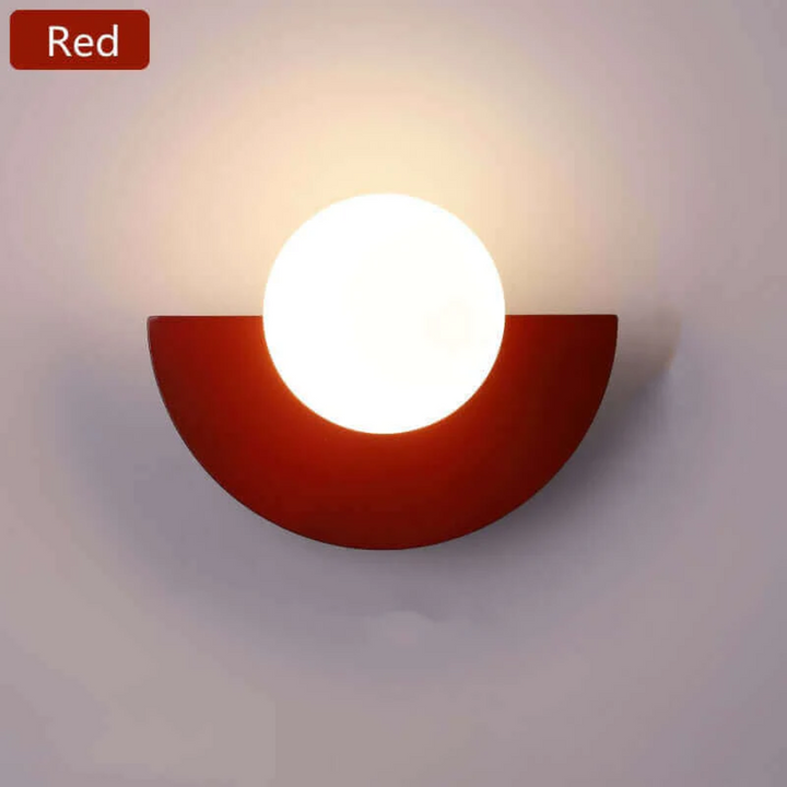 Artistic metal half moon LED wall lamp, bringing modern ambient light to your home decor.