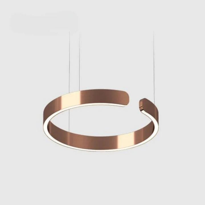 Gold HaloRing LED circle pendant light. Dimmable, modern design, ideal for dining room or kitchen island.