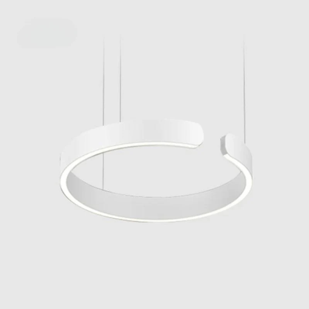 Rose gold modern LED circle pendant light. Elegant HaloRing design, dimmable, adds contemporary flair.