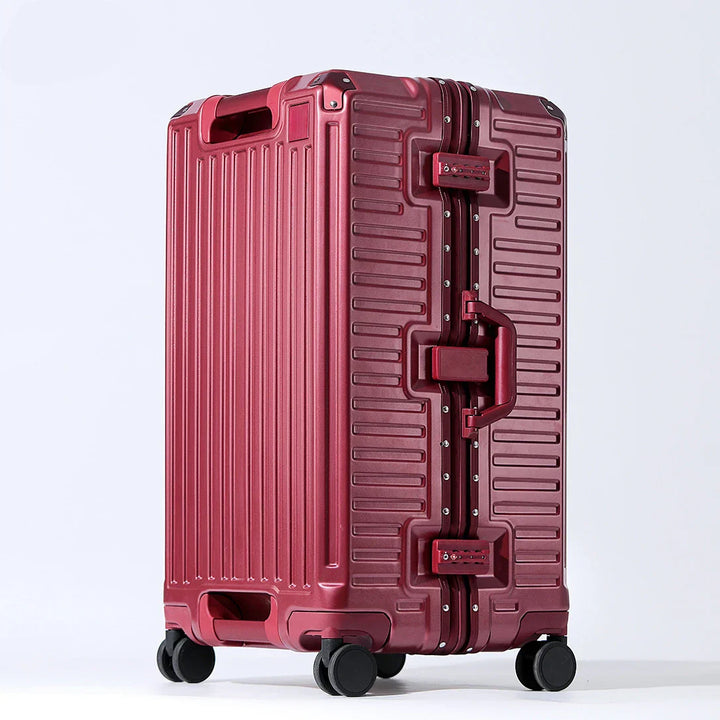 Modern hard shell suitcase with wide handle and spinner wheels for effortless travel and vacation.