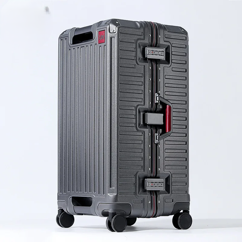 Sleek hard shell travel suitcase with a wide handle, perfect for navigating airports and modern trips.