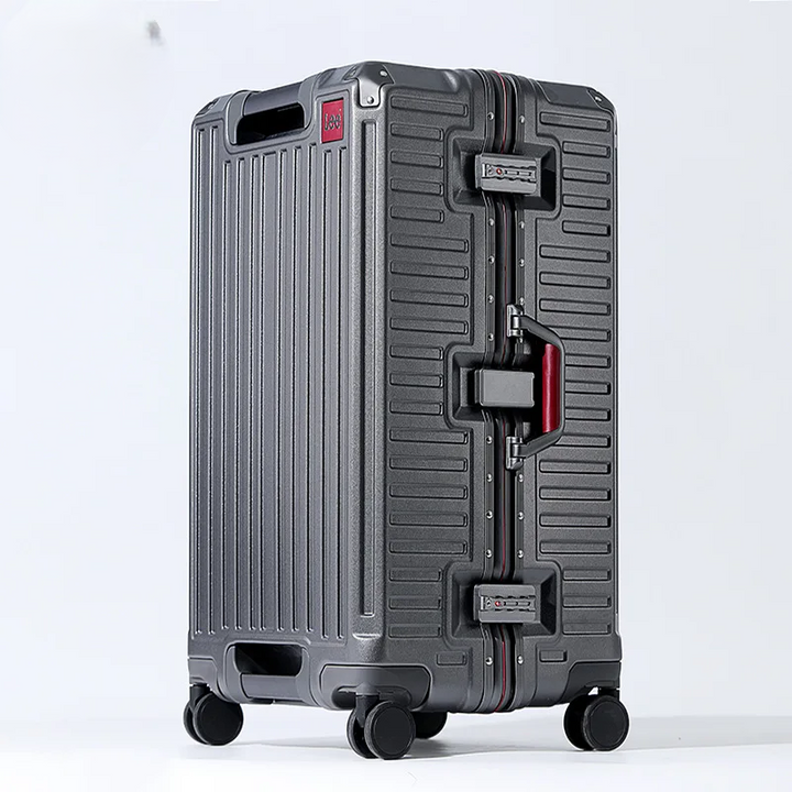 Sleek hard shell travel suitcase with a wide handle, perfect for navigating airports and modern trips.