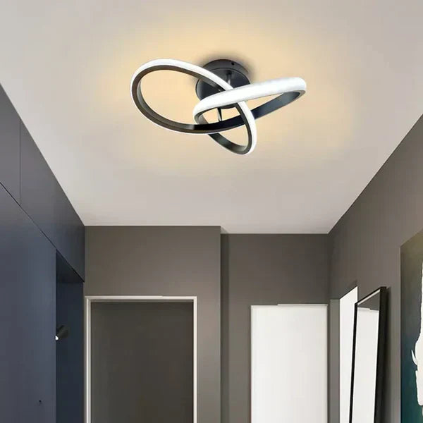 Modern LED ceiling lamp with dual ring design. Perfect for contemporary living rooms & offices.