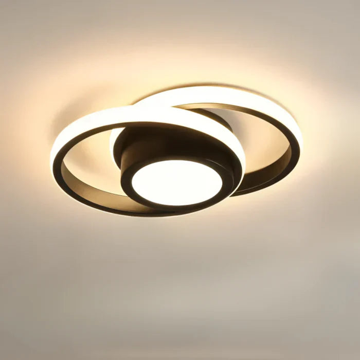 Bright LED ceiling light with a modern dual-ring aesthetic. Essential contemporary home decor element.