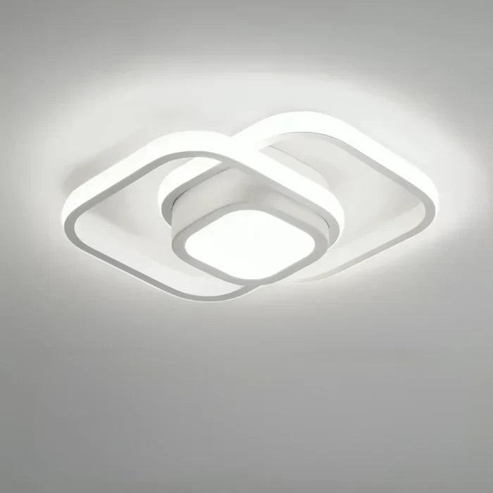 Versatile LED ceiling lamp, sleek double ring design. Provides effective and stylish lighting for any room.