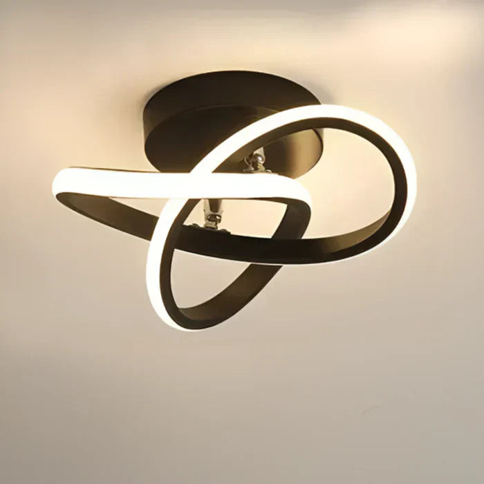 Geometric LED ceiling light, "Twilight Rings" design. Provides modern and energy-efficient illumination.