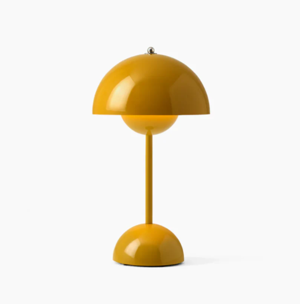 Modern LED table lamp with intuitive touch controls for illuminating bedrooms, desks, & living spaces.