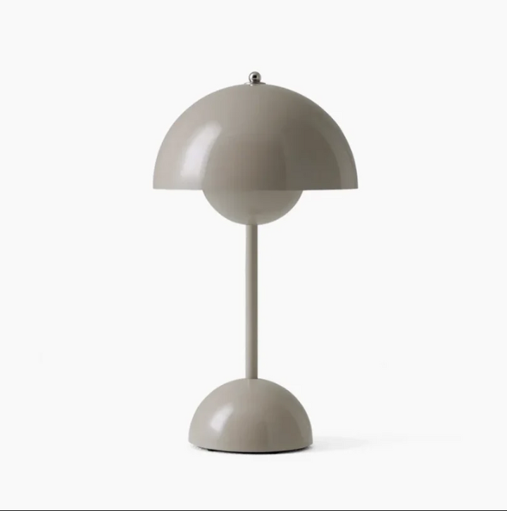 Touch-control LED desk lamp, perfect for reading or tasks in a modern bedroom or home office.