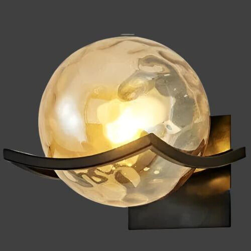 The sleek profile of the modern LED wall lamp against a wall.