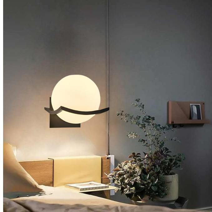 Close-up of a Modern LED wall lamp showing its sleek glass details.