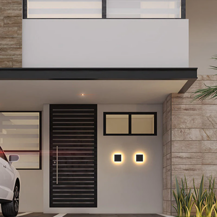 Zenith outdoor LED wall lamp, a sleek minimalist design for any garden.
