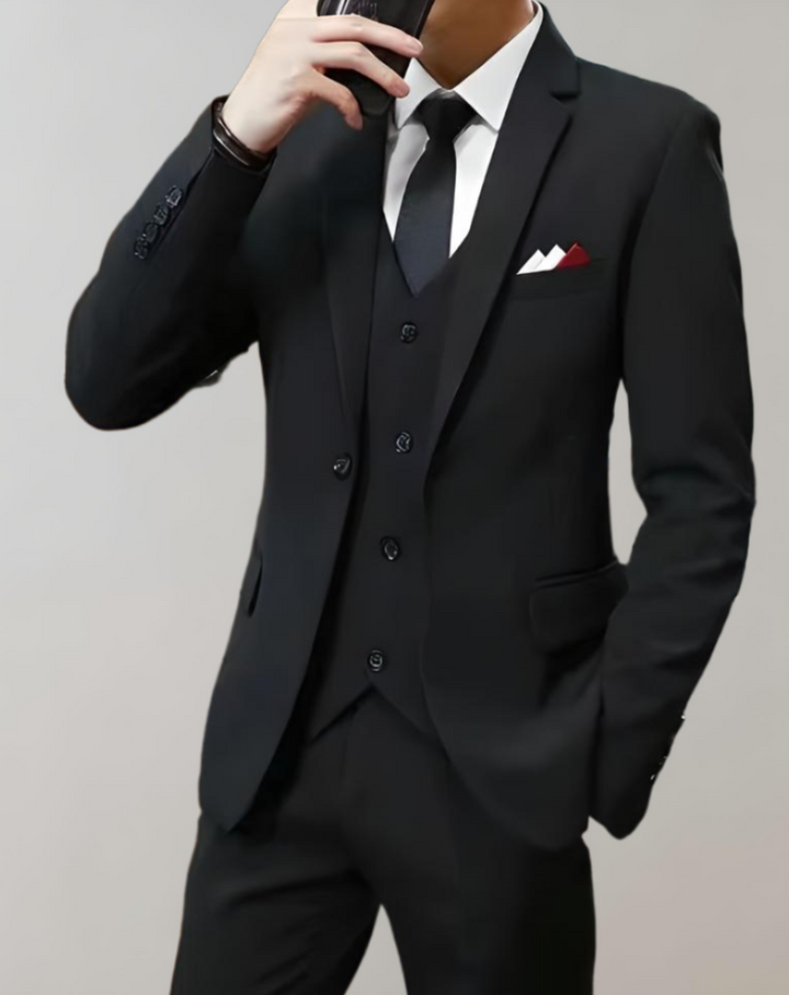 Modern men's 3-piece suit for formal events & business meetings. Tailored, elegant men's fashion.