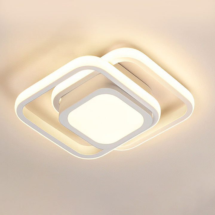 "Modern Minimalist Halo Duo Ceiling Light with a sleek, circular design providing warm, ambient LED illumination."