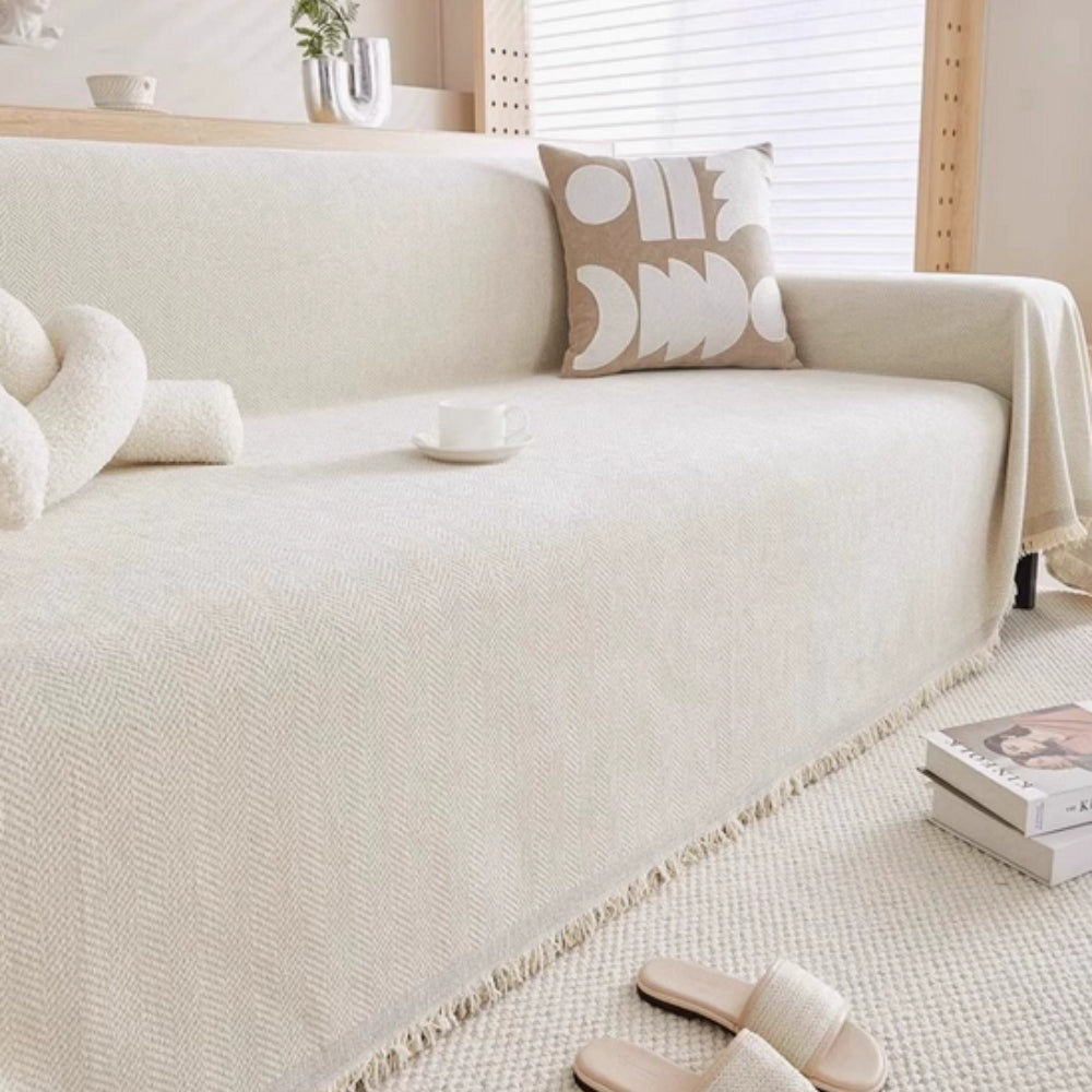Versatile modern furniture cover, a minimalist sofa throw providing style & pet-friendly protection in the living room.