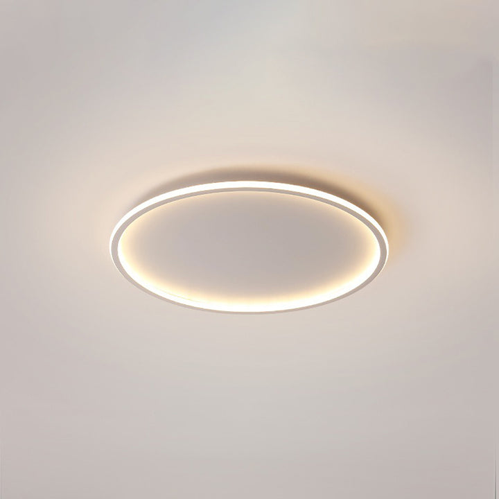 "Modern Nordic LED Ceiling Light with minimalist round flush mount design, providing soft even illumination for modern interi