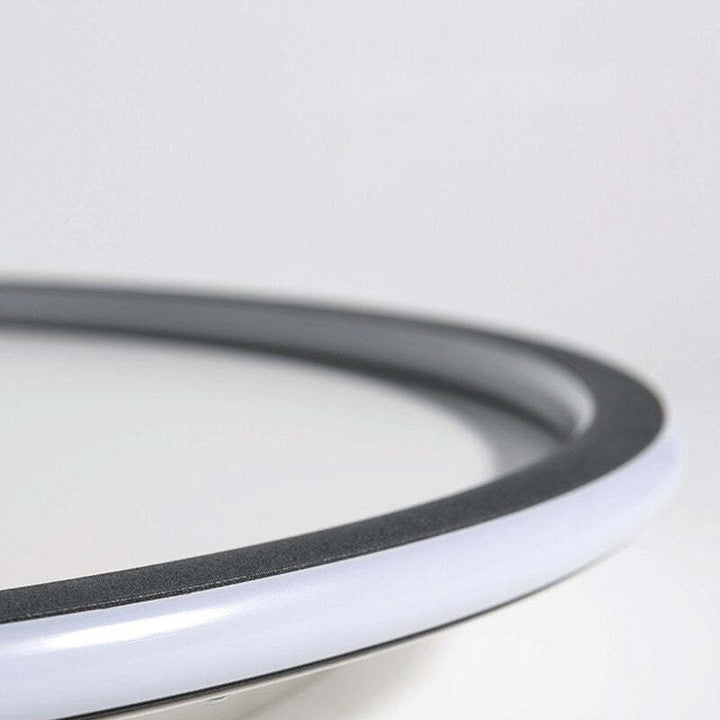 "Modern Nordic LED Ceiling Light with minimalist round flush mount design, providing soft even illumination for modern interi