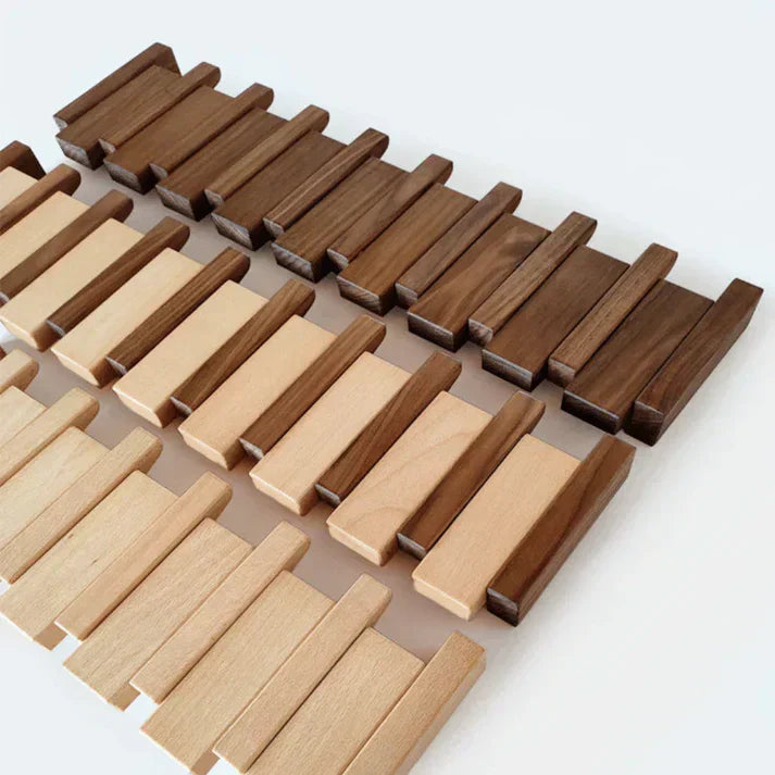 Modern piano key wooden coat rack with 6 hooks for entryway organization. Stylish home decor wall hook.
