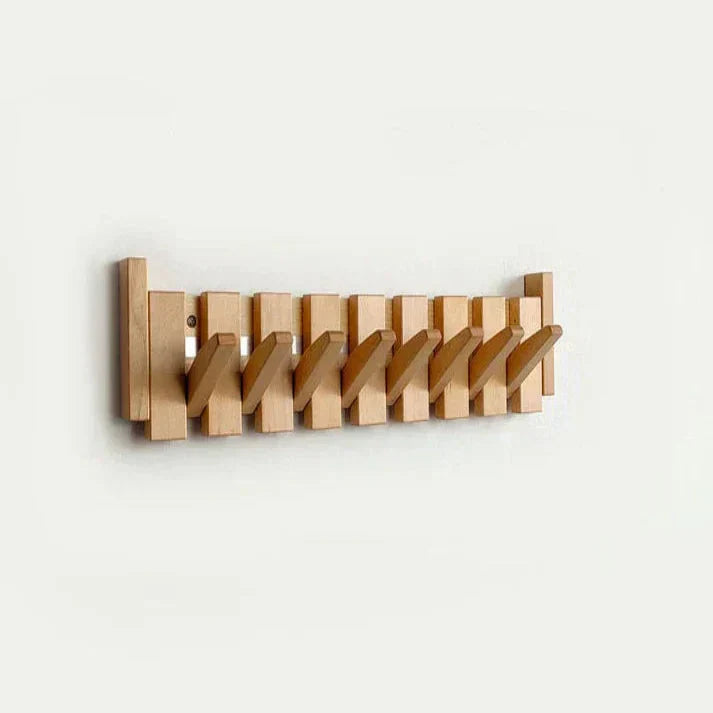Unique piano key wooden coat rack, 4 hooks, walnut finish. Perfect compact wall decor for entryway organization.