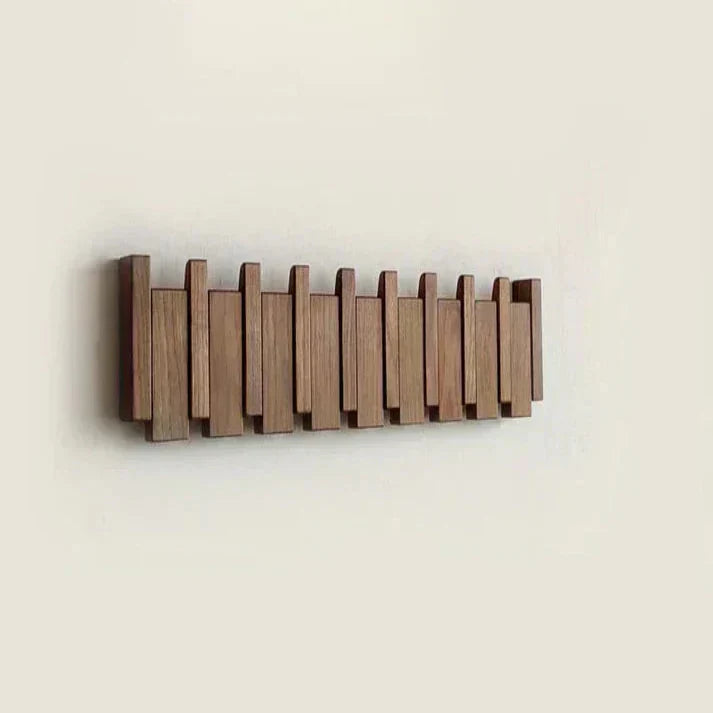 Stylish beech wood piano key coat rack, 6 wall hooks for coats & bags. Modern home decor for your entryway.