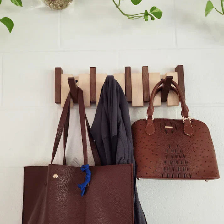 Beech wood piano key wall hook rack, 4 hooks. Stylish and functional home decor for jackets & accessories.